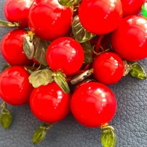 Vintage glass cherry pin.